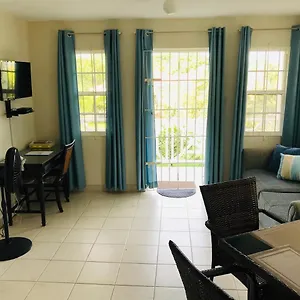 https://turtle-ridge-apartments.comcaribbean.com